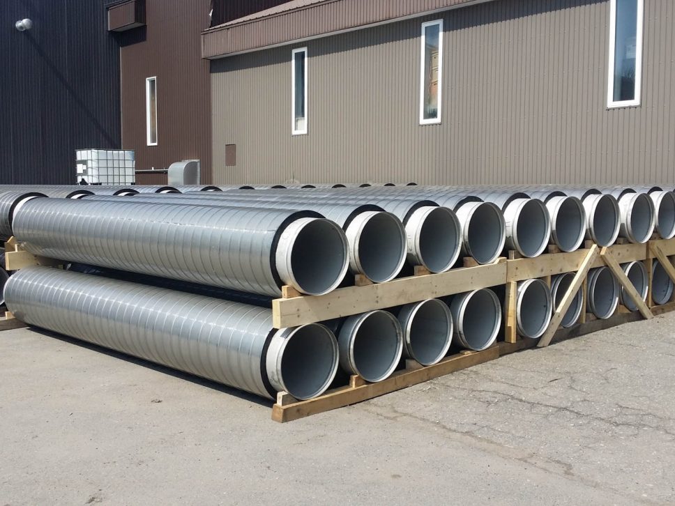Pre-insulated stainless steel pipes with polyurethane foam and external protection in spiral galvanized steel.